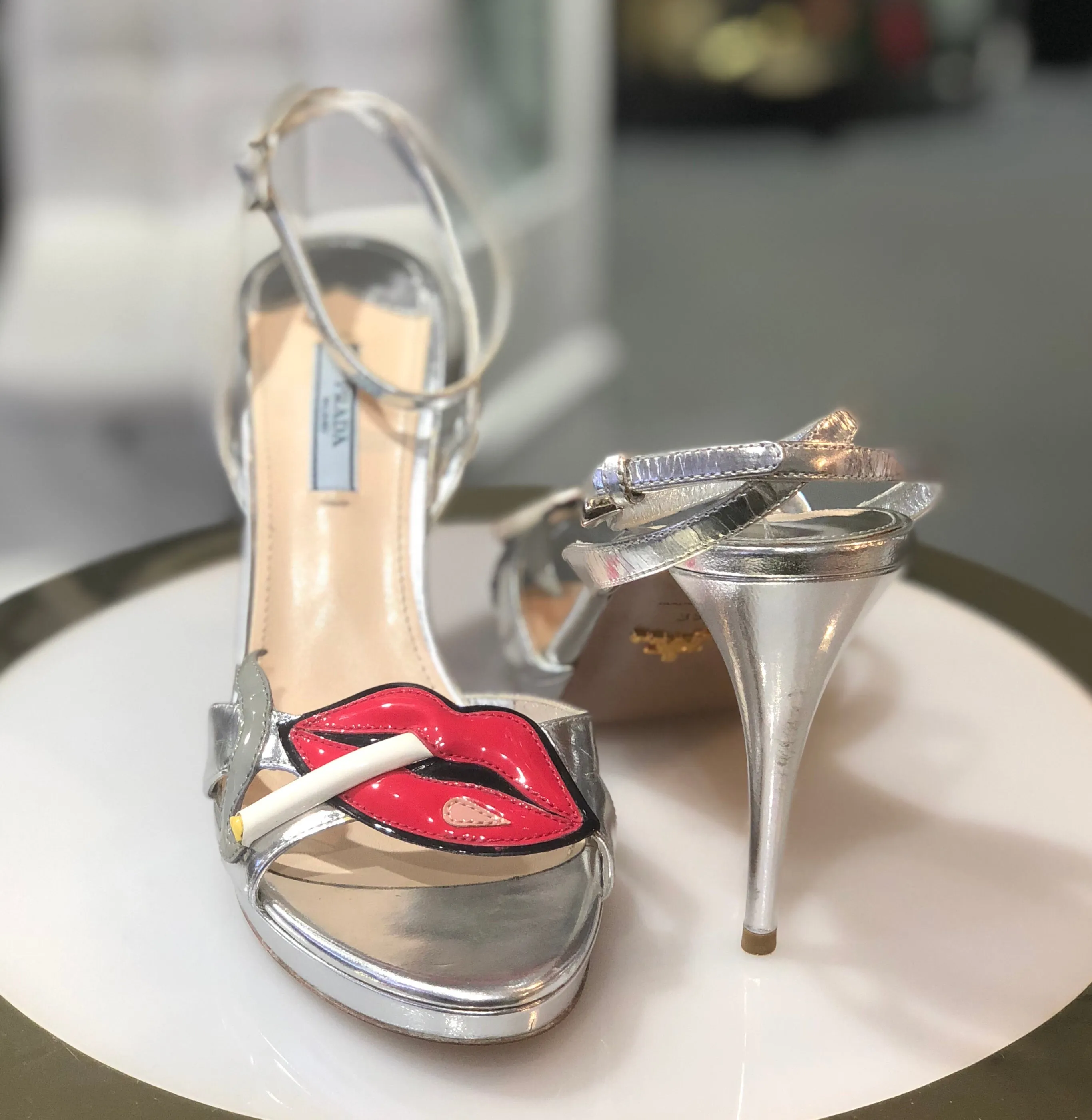 Prada lips and cigarette heels