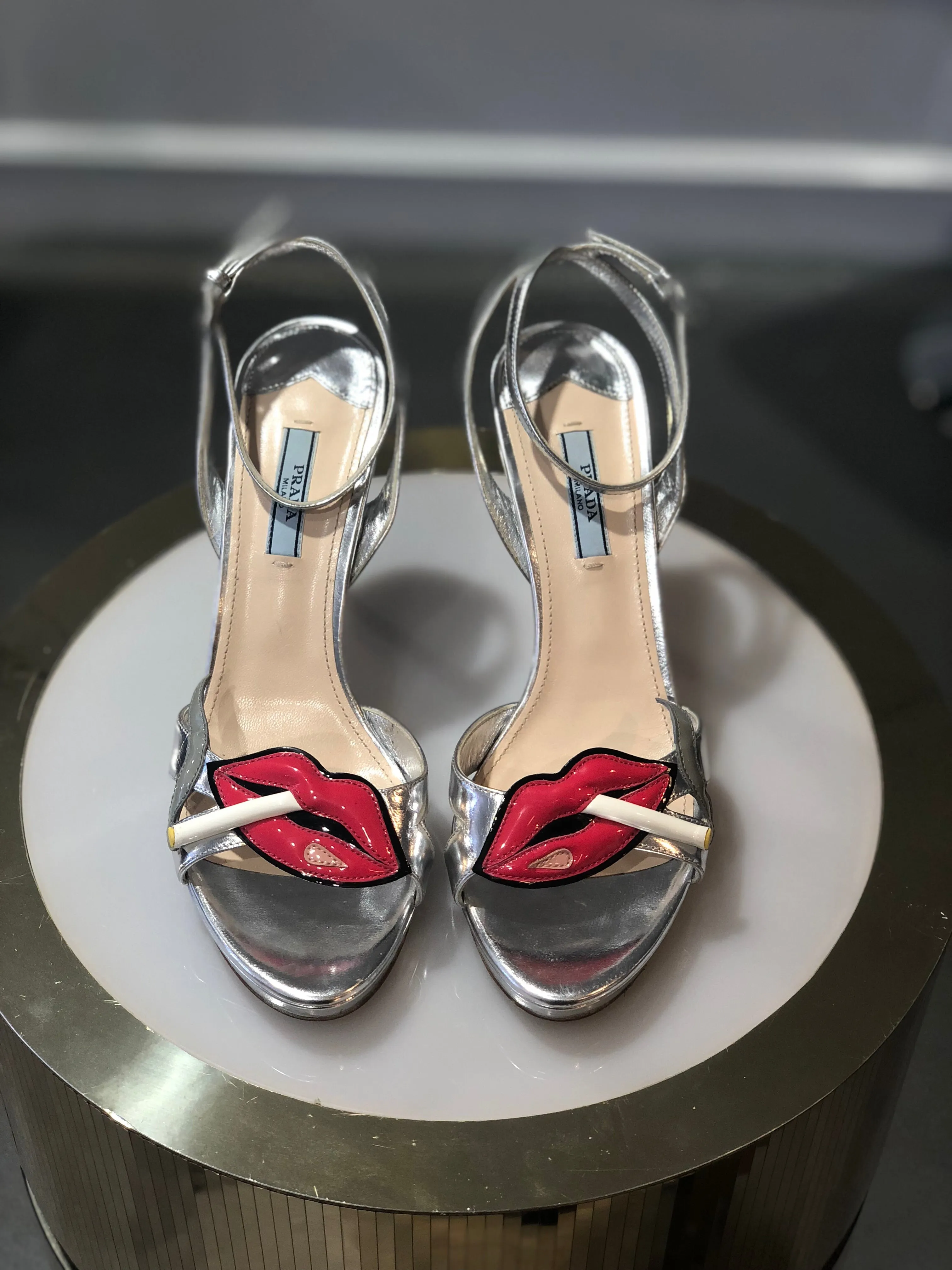 Prada lips and cigarette heels